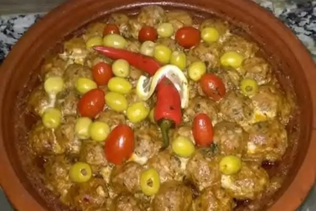 Moroccan kefta tagine with spiced meatballs and tomato sauce